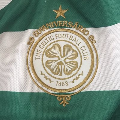 The Celtic crest embroidered on Jimi Gill's shirt.